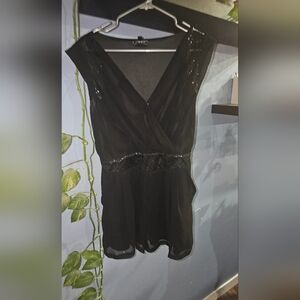 3/20.00. Black sequin romper.